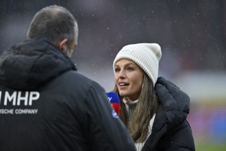 SKY reporter presenter Mara Mones wears cap in interview microphone micro logo with CEO managing