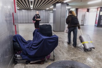 Winter in Stuttgart. A homeless person has made a home for himself in the Velcro Passage.