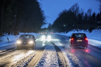Country road with snow and slush Bergisches Land, near Marienheide, North Rhine-Westphalia, Germany