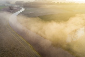 Aerial view of Hunte with fog in the morning near Bühren, Wildeshausen, Lower Saxony, Germany