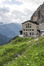 Rifugio Maria E Alberto Ai Brentai mountain hut and rocky peak, Brenta, Trentino, Italy