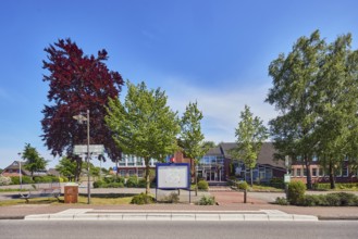 Neuenkirchen Rathaus bus stop, town hall of the municipality of Neuenkirchen-Vörden, street,