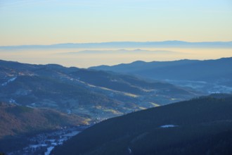 Morning view of hills and valleys with light fog and peaceful ambiance, looking towards the Rhine