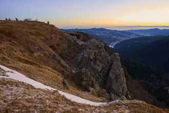 Rocky hill at sunset with a wide view, looking towards the Rhine Valley, viewpoint, La Gorge de