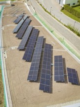 Aerial view of structured solar modules on a gravel roof, new Park and Ride Calw Heumaden car park