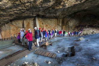 Hikers in the Schellenberger Ice Cave, Untersberg Massif, Berchtesgadener Land, Upper Bavaria, Alps