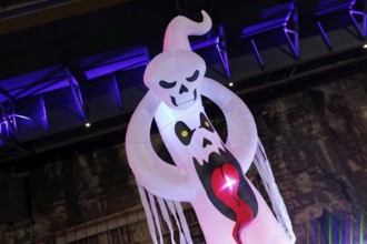 Illuminated ghost figure at Halloween Run, night run in the Dusiburg-Nord Landscape Park, Duisburg,