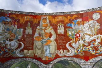 Colourful mural with historical figures and symbolic representations, Georgian-Russian Friendship