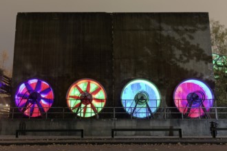 Four colour-illuminated fans at the cooling plant of the former steelworks, Landschaftspark