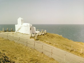 Historic listed building, Huer's Hut, a hermitage and lighthouse, Towan Headland, Newquay,