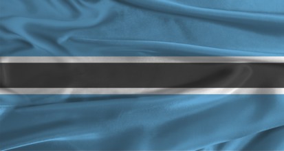 Flag of Botswana with fabric textured background. Close up of National flag of Botswana with