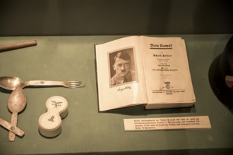 Book Mein Kampf with portrait and signature of Hitler in a museum exhibition at the Kiberg Partisan