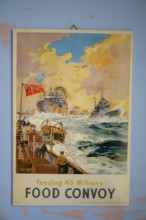Propaganda poster of a convoy fleet with stormy sea and clouds, in the Partisan Museum in the old