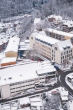 Snowy city view with modern and traditional houses in winter, Calw, Black Forest, Germany