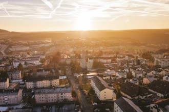 A panoramic view of a city in the light of sunset, with accentuated sky, Calw, Black Forest,