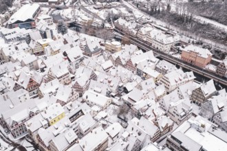 Snowy old town with half-timbered houses from a bird's eye view, winter atmosphere, Calw, Black