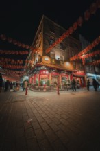 Illuminated street in China Town at night with red lanterns, China Town London, England, Great