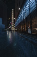 Modern buildings with blue lighting, quiet atmospheric scene, London, England, United Kingdom