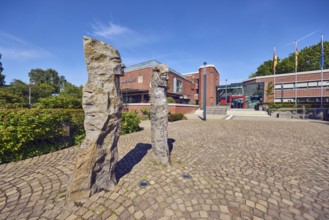 Town hall, stone sculpture, sculpture of people, brick building, modern architecture, lantern,