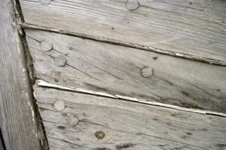 Close-up of weathered wooden planks of an old fishing boat, Vestre Jacobselv, Finnmark, Norway