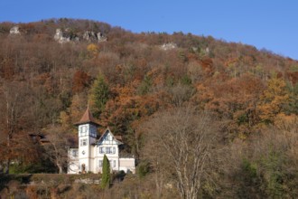 Historic villa in mixed autumn forest in Franconian Switzerland, Muggendorf, Upper Franconia,