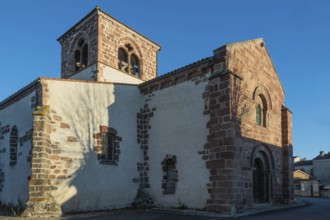 Azerat village. Roman church Saint-Jean-Baptiste . Haute Loire. Auvergne Rhone Alpes. France