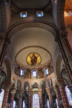 Issoire. Colourful columns of the Roman abbatial St Austremoine, Auvergne Rhone Alpes, France