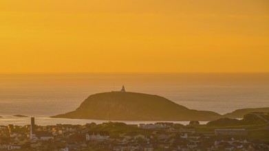 View of the city of Vardø from Mount Domen in the background the island of Hornoya with the