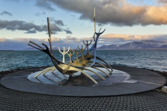 Sólfar sculpture, Solfar, sunrise, steel Viking ship by Jón Gunnar Árnason, evening with a view of