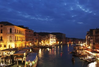 View of the Grand Canal from the Rialto Bridge in the evening, Venice, Veneto, Italy