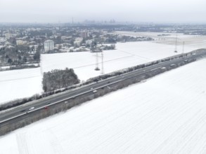 The fields in the north-west of Frankfurt am Main covered in snow. (Aerial view with a drone) On
