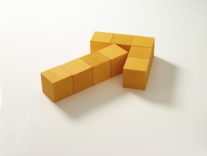 9 yellow wooden cubes against a white background