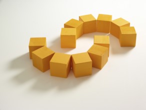 12 yellow wooden cubes against a white background