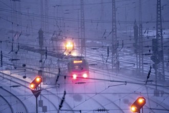 Winter weather, snowfall, regional train train, regional traffic, on the route east, in front of