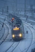 Winter weather, snowfall, S-Bahn train, S1, regional traffic, on the route east, in front of Essen