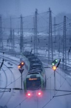 Winter weather, snowfall, S-Bahn train, regional traffic, on the route east, in front of Essen main