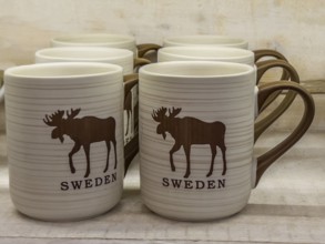 Swedish souvenir: mugs with moose picture in Småland Moose park in Markaryd, Småland County,