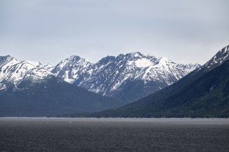 View over the Turnagain Arm estuary to the mountains of the Kenai Peninsula, Anchorage, Alaska, USA