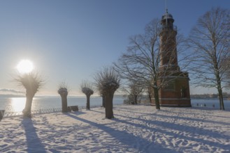 Holtenau lighthouse at the entrance of the Kiel Canal in winter, west bank of the Kiel Fjord,