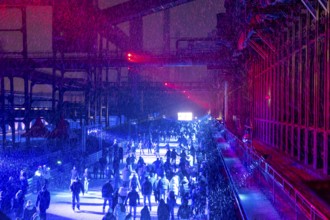 Ice rink at the Zollverein coking plant, ice skating with music and many lighting effects, Essen,