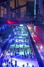 Ice rink at the Zollverein coking plant, ice skating with music and many lighting effects, Essen,