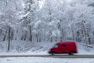 Delivery truck drives through snowy landscape, trees, winter, snow, Sieversen, Samtgemeinde