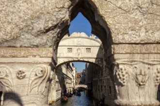 View of the Bridge of Sighs through the railing of the Ponte della Paglia, Venice, Veneto, Italy