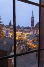 December 22, 2025, View from a window inside the Roemer looking down at the Frankfurt Christmas
