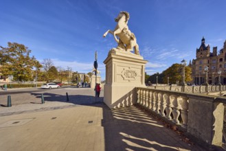Castle bridge, entrance portal, horse sculpture, car bridge and footbridge, sidewalk, sandstone