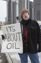Detroit, Michigan USA, - 3 January 2026 - Activists rally in downtown Detroit to protest President