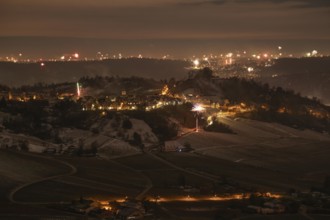 New Year's Eve view from Kapellberg near Fellbach towards Rotenberg. View of the grave chapel in
