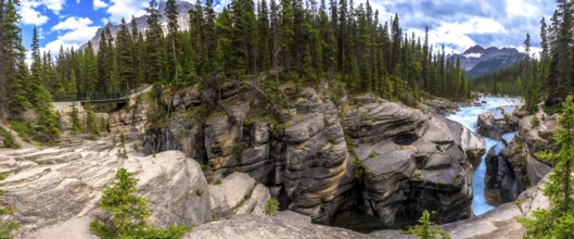 Mistaya canyon, showcasing the stunning artistry of erosion on rock formations in banff national