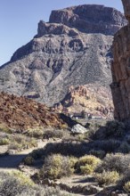 Steep mountain scenery with sparse vegetation in a dry landscape, Pico del Teide National Park, La