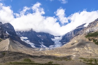 Athabasca glacier, part of the columbia icefield, reveals its shrinking beauty against the rugged